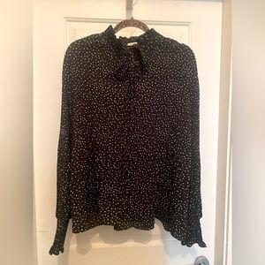 Black and white accordion fabric long sleeve blouse